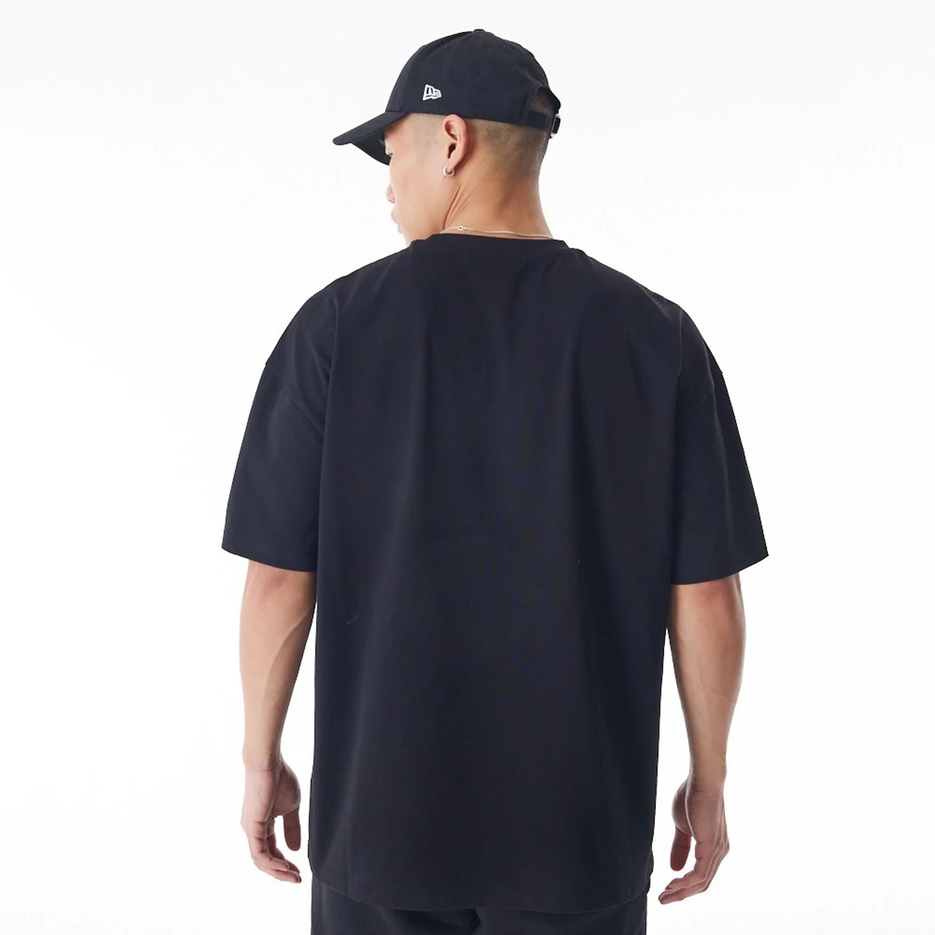 The Male model is wearing  New Era Flag Black Oversized T-Shirt  2