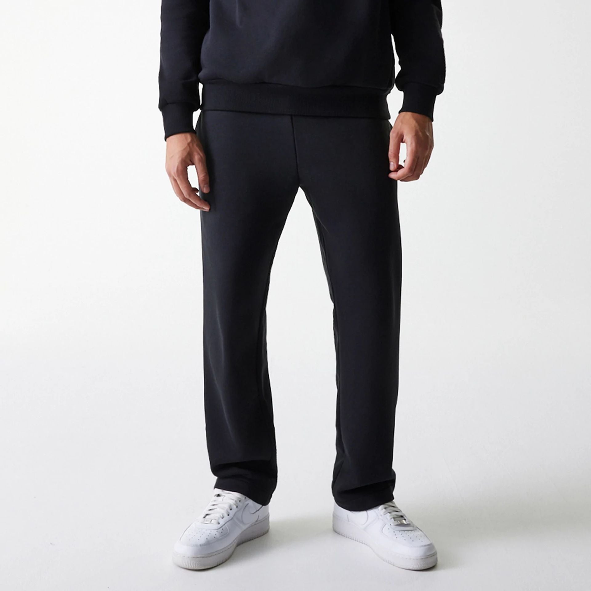 The Male model is wearing  New Era Black Straight Leg Joggers  8