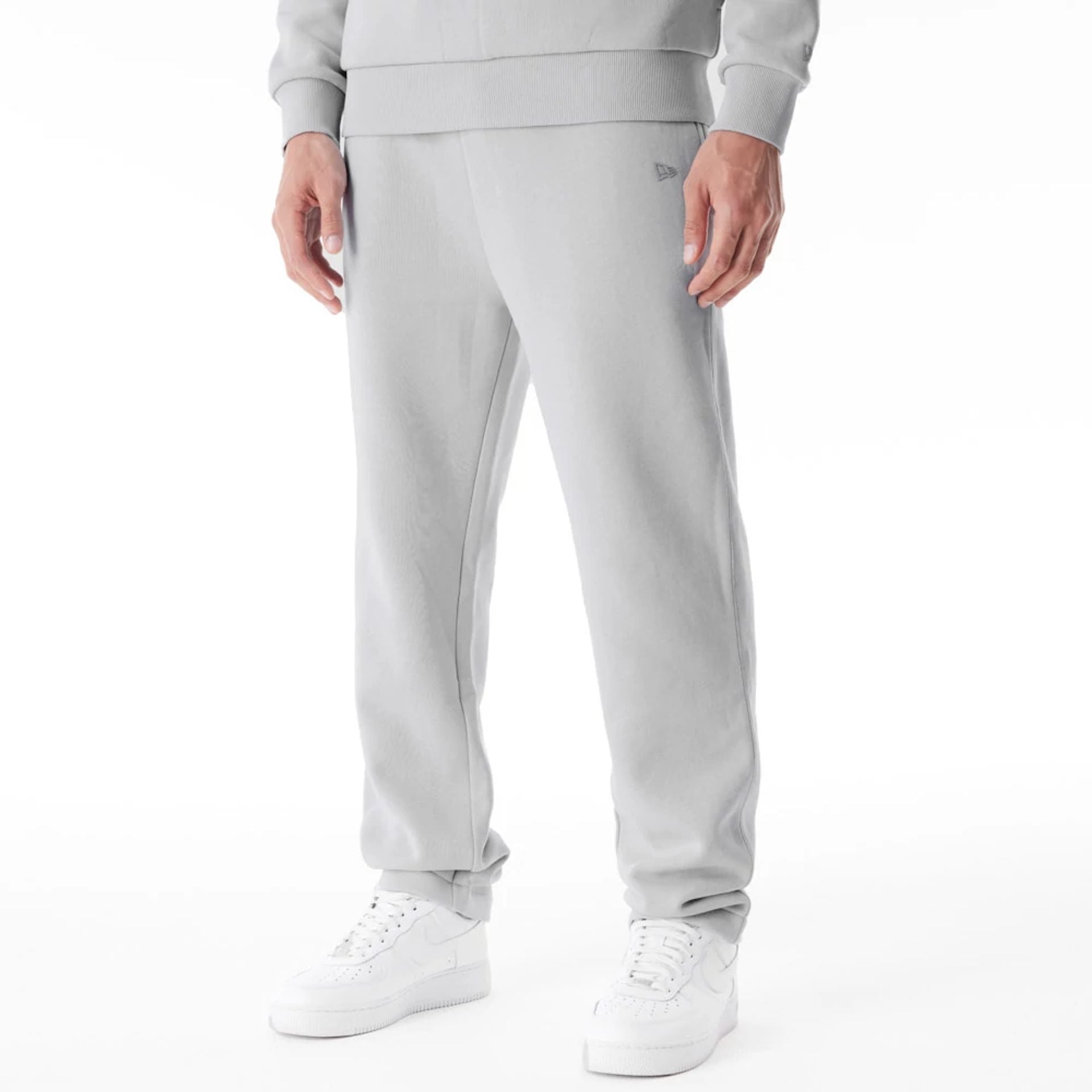 The Male model is wearing  New Era Grey Straight Leg Joggers  1