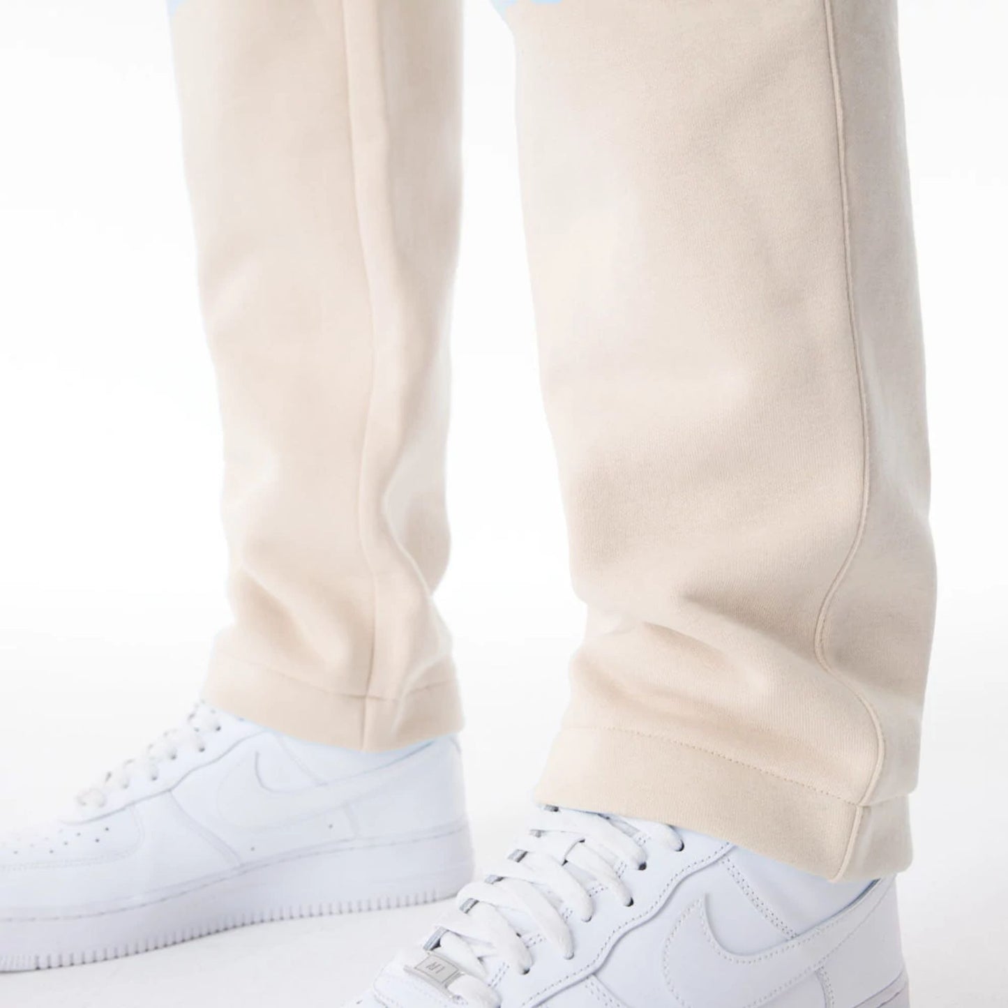 The Male model is wearing  New Era Cream Straight Leg Joggers  7