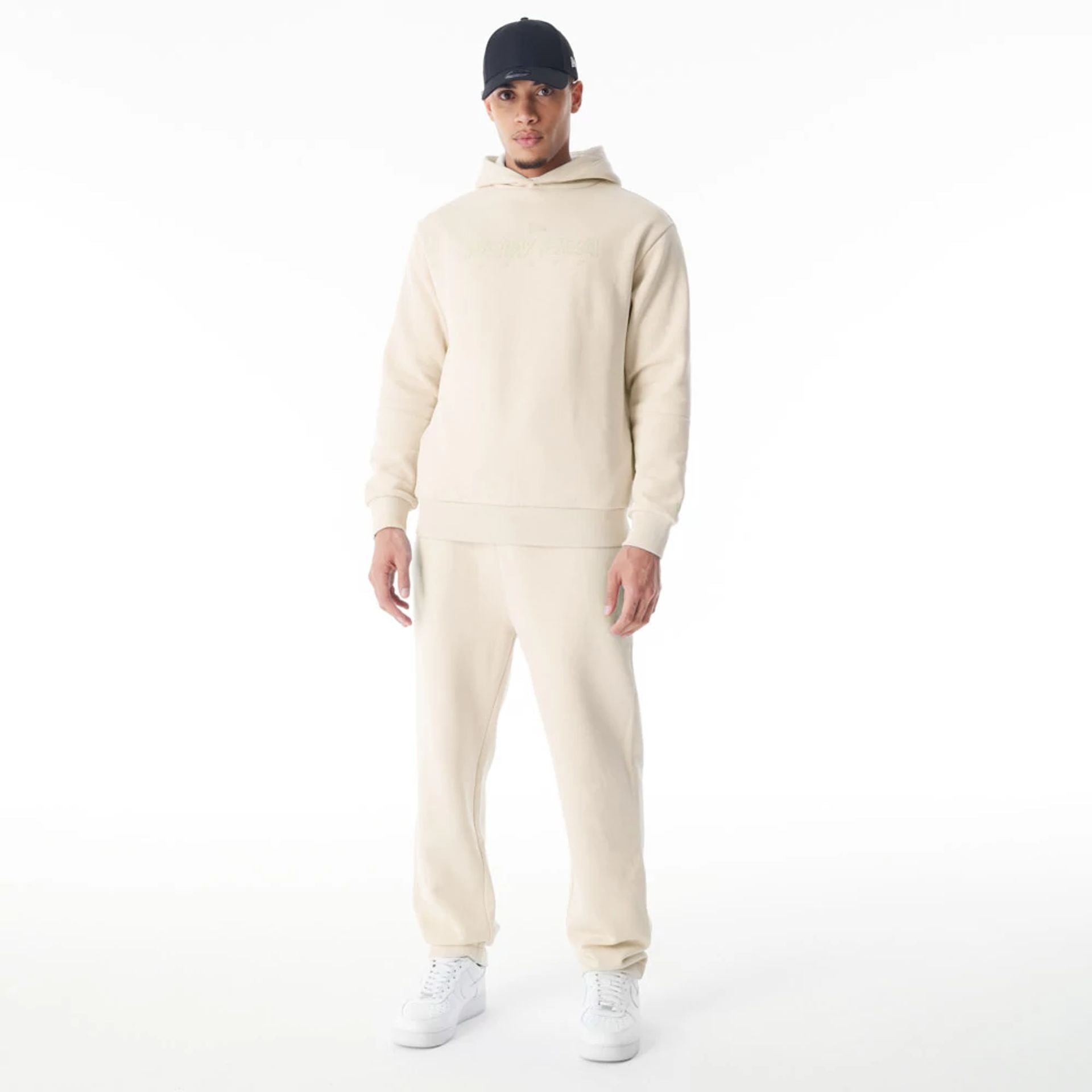 The Male model is wearing  New Era Cream Straight Leg Joggers  5