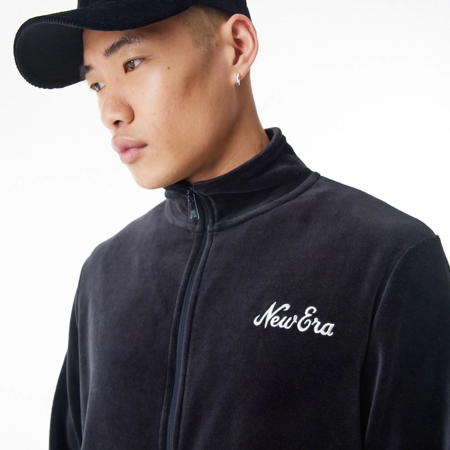 The Male model is wearing  New Era Velour Black Track Jacket  9