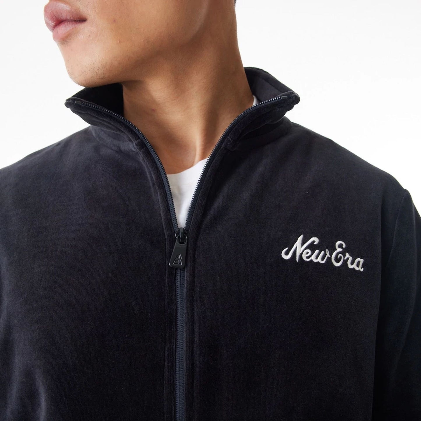 The Male model is wearing  New Era Velour Black Track Jacket  10