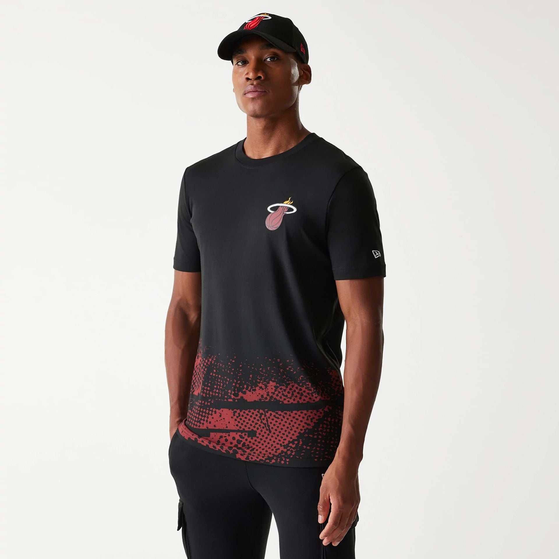 The Male model is wearing Miami Heat NBA Tip Off Black T-Shirt 1