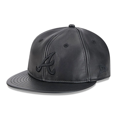 This is a Atlanta Braves Genuine Leather Black Retro Crown 9FIFTY Strapback Cap 1