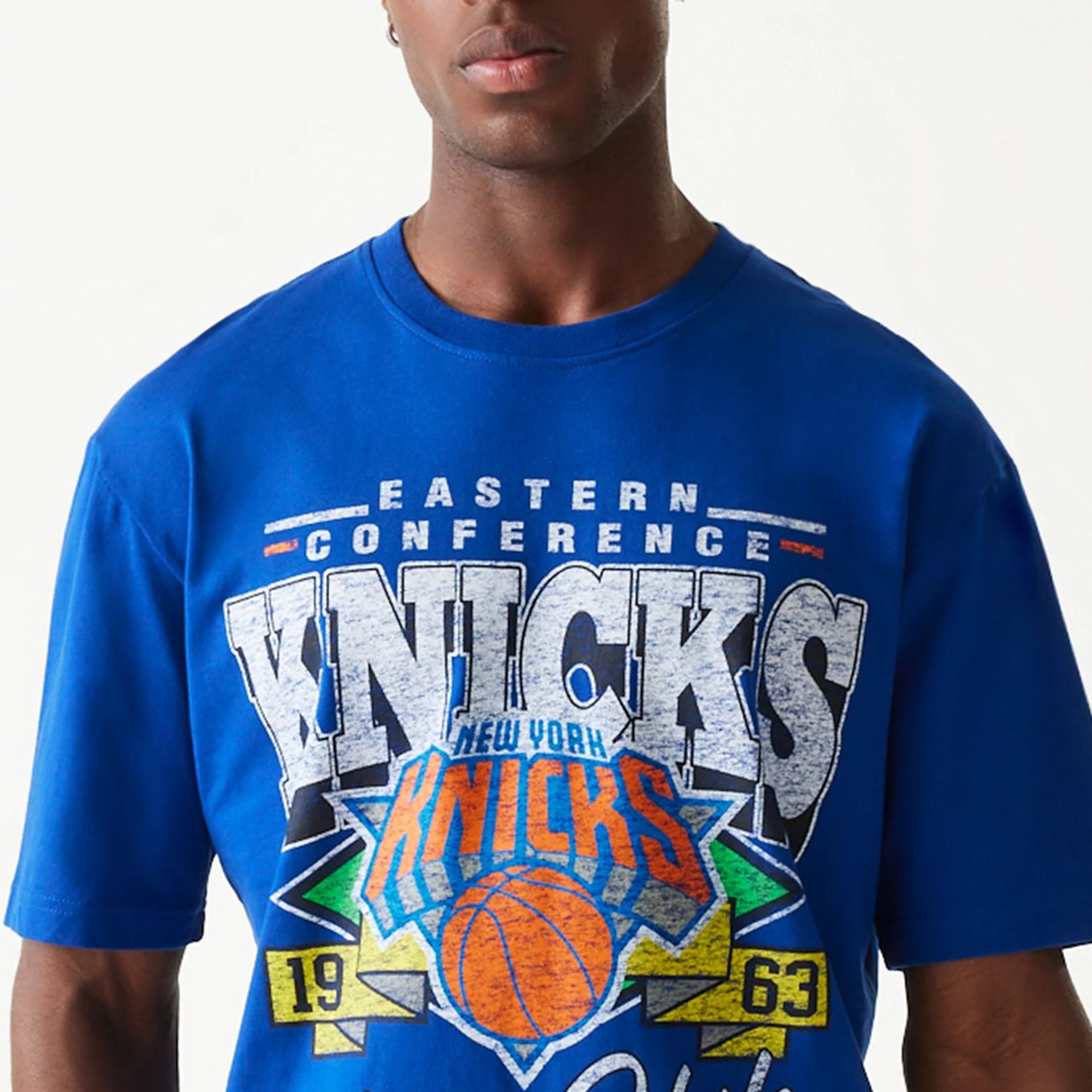 The Male model is wearing New York Knicks Sport Classic Blue T-Shirt 6