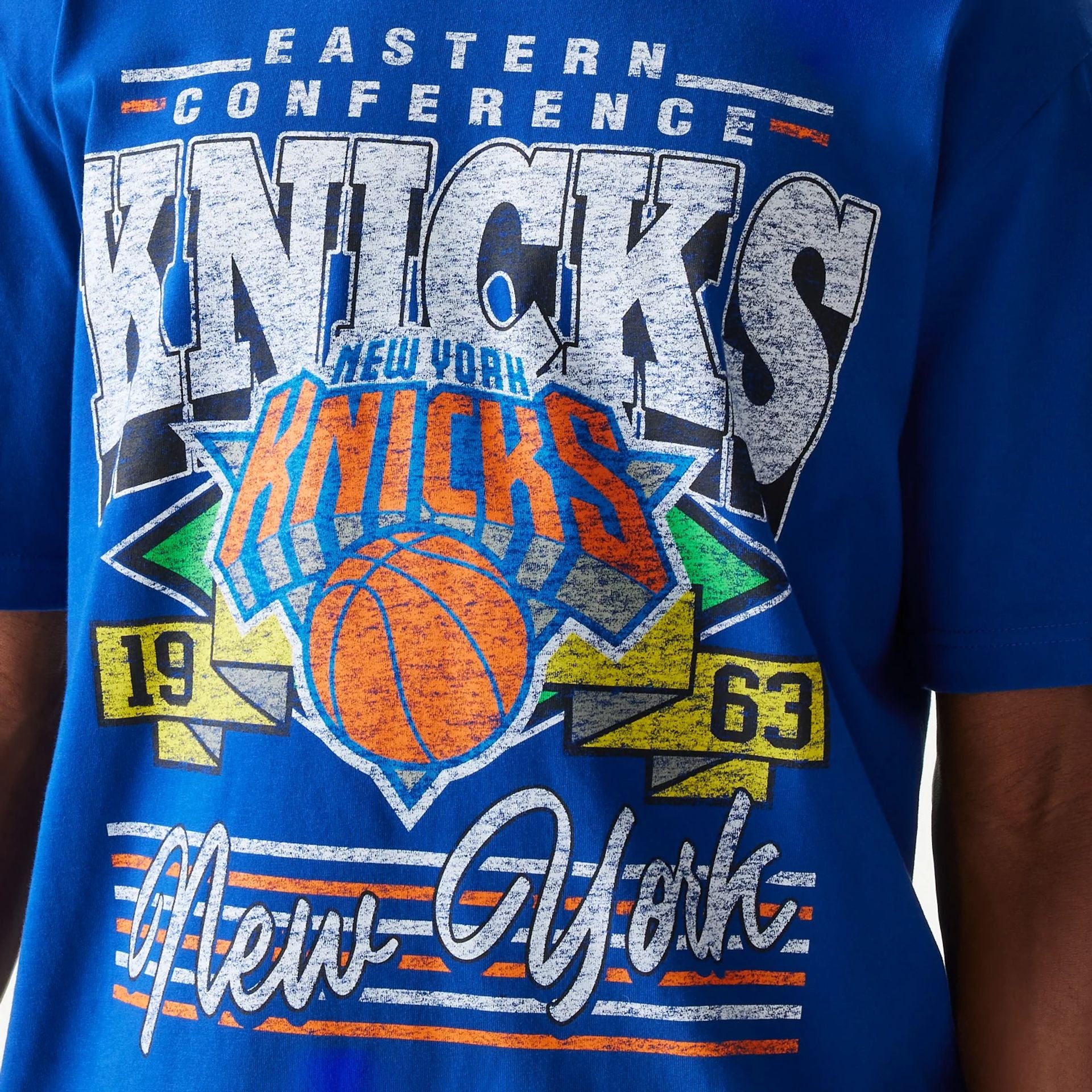 The Male model is wearing New York Knicks Sport Classic Blue T-Shirt 3