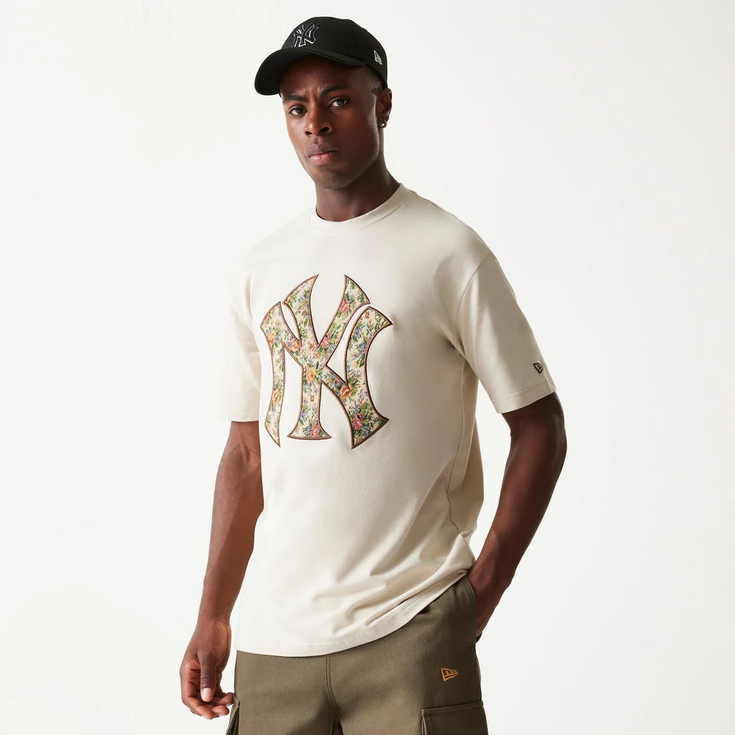 The Male model is wearing New York Yankees Upholstery Light Beige T-Shirt 1