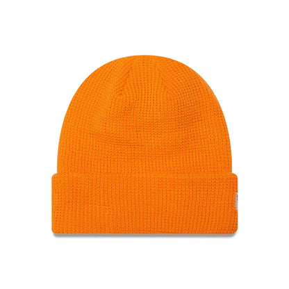 This is a New Era Waffle Knit Orange Beanie Hat 1