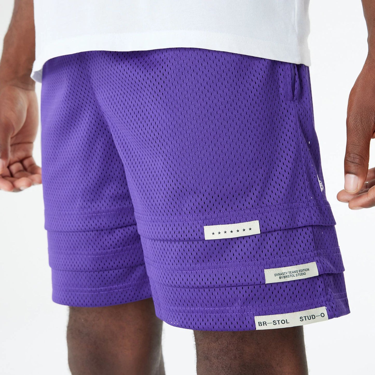 The Male model is wearing LA Lakers Bristol Studio x NBA Purple Shorts 5