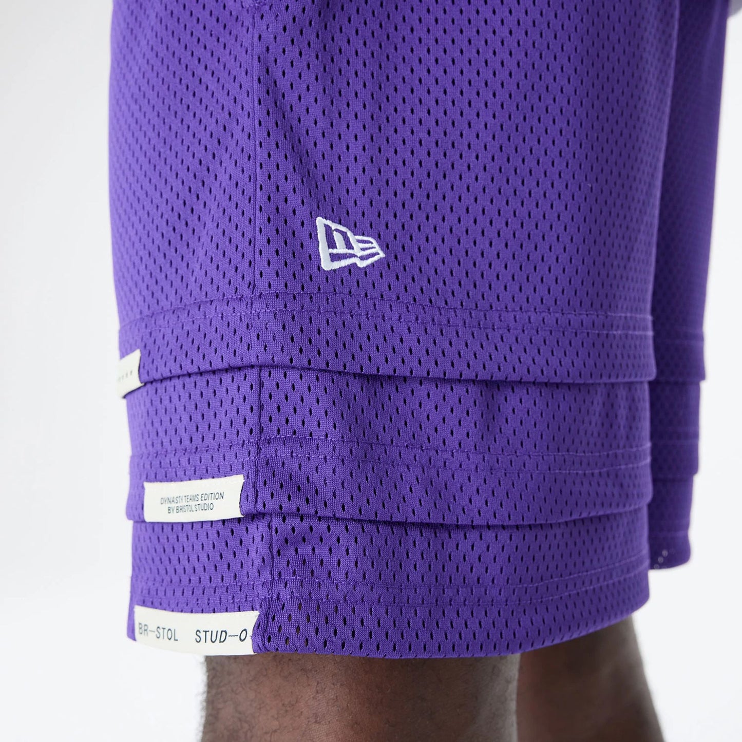 The Male model is wearing LA Lakers Bristol Studio x NBA Purple Shorts 6