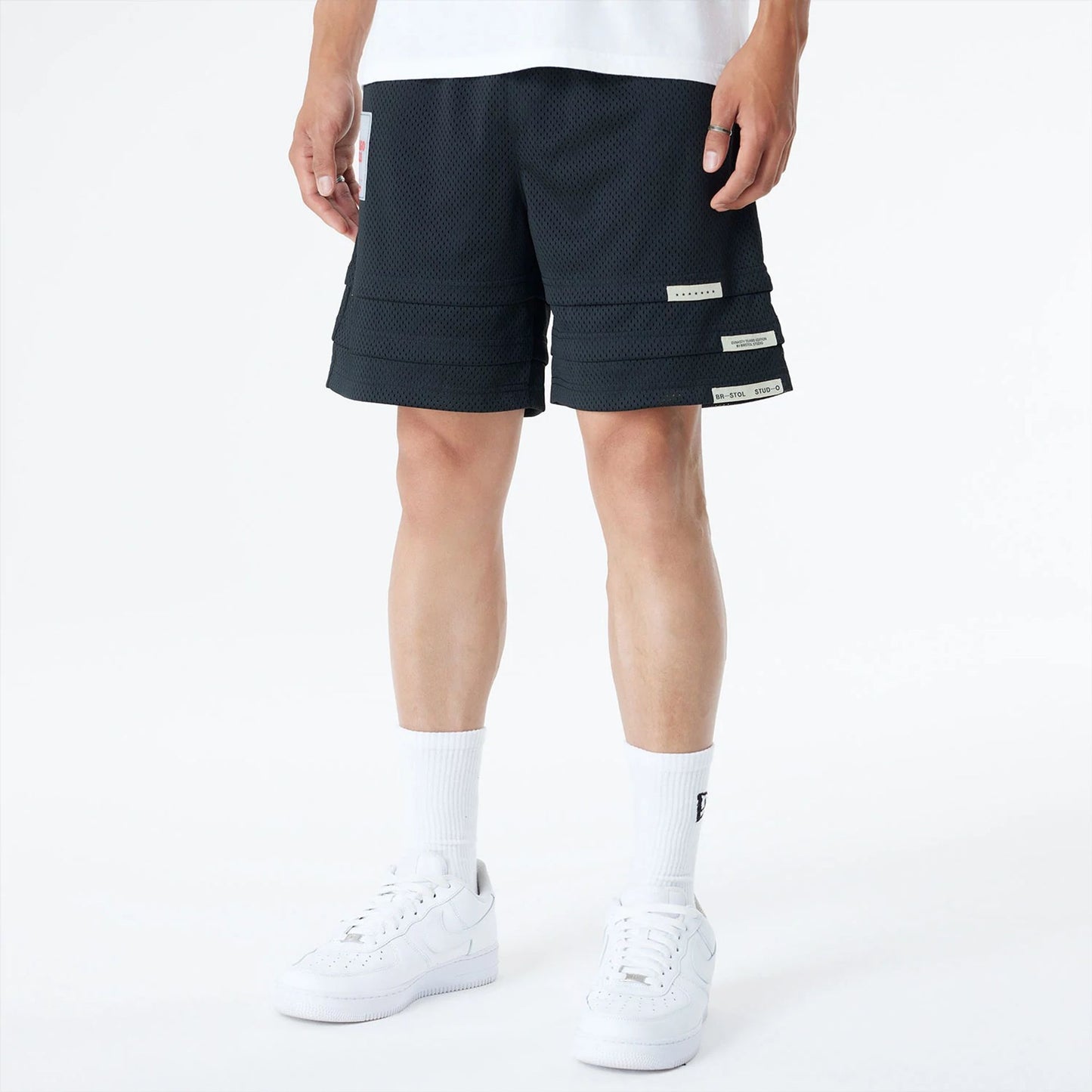 The Male model is wearing Chicago Bulls Bristol Studio x NBA Black Shorts 7