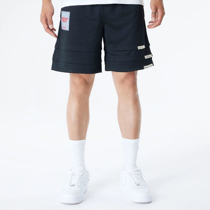 The Male model is wearing Chicago Bulls Bristol Studio x NBA Black Shorts 1