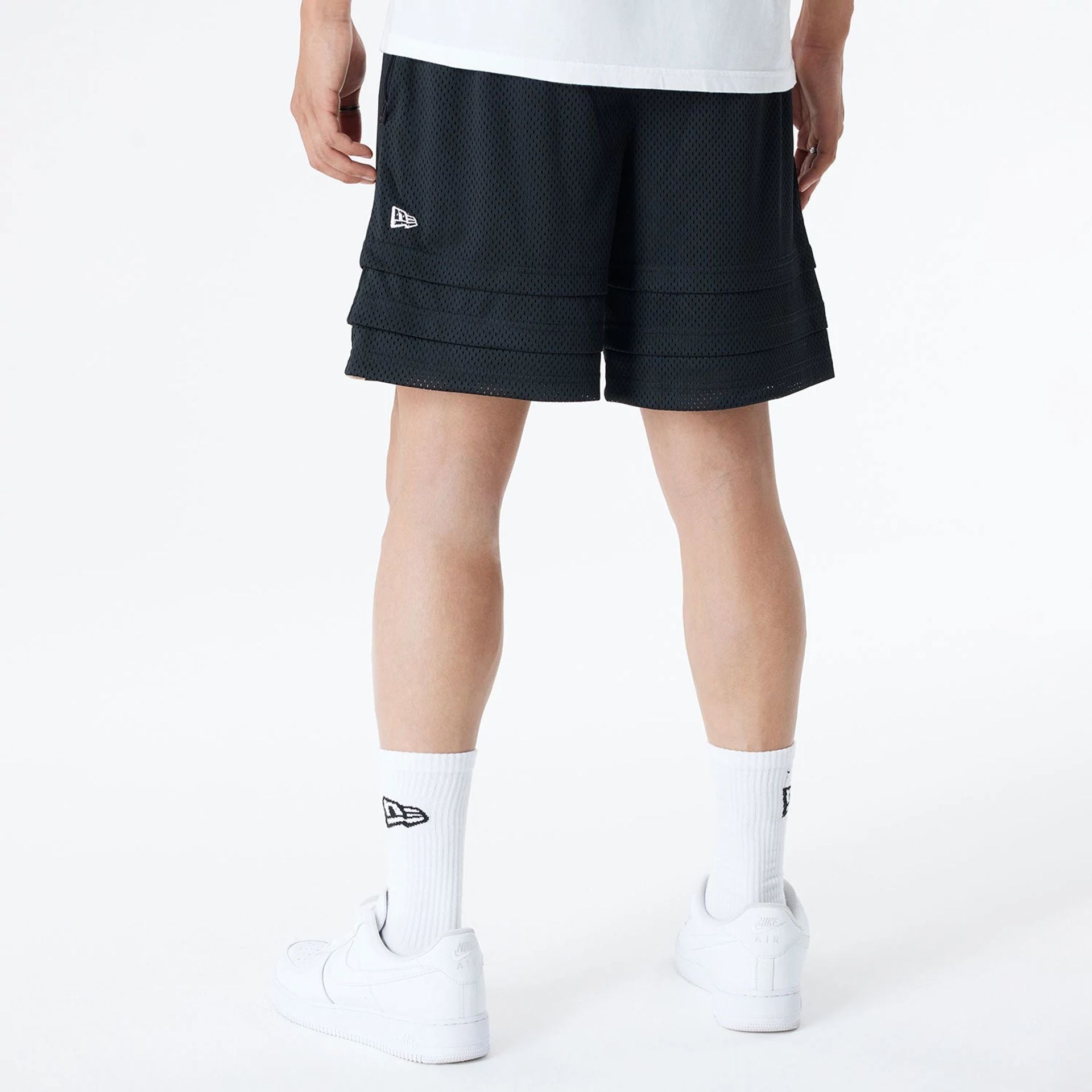 The Male model is wearing Chicago Bulls Bristol Studio x NBA Black Shorts 2