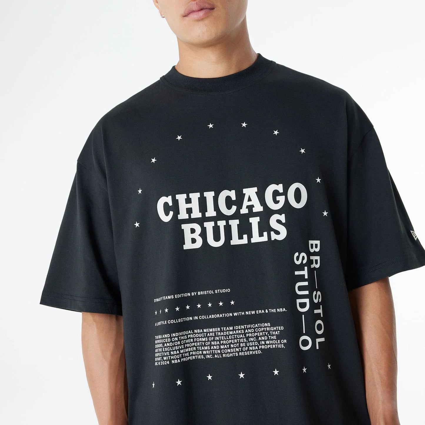 The Male model is wearing Chicago Bulls Bristol Studio x NBA Black Oversized T-Shirt 3