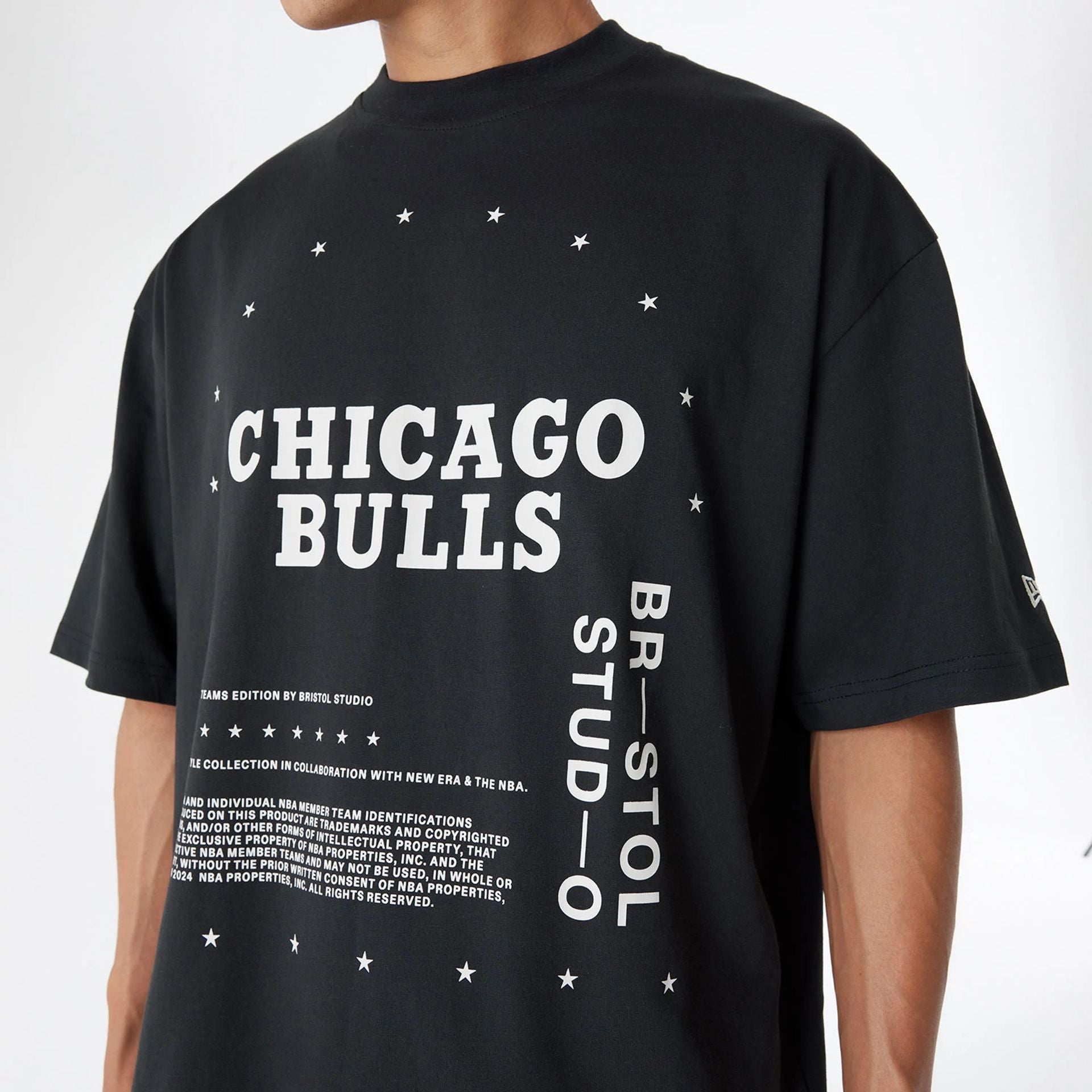 The Male model is wearing Chicago Bulls Bristol Studio x NBA Black Oversized T-Shirt 5