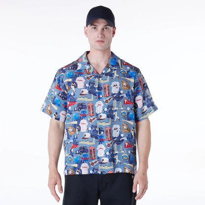 The Male model is wearing MLB Multi Team MLB London Games 2024 Revere Navy Short Sleeve Shirt 1