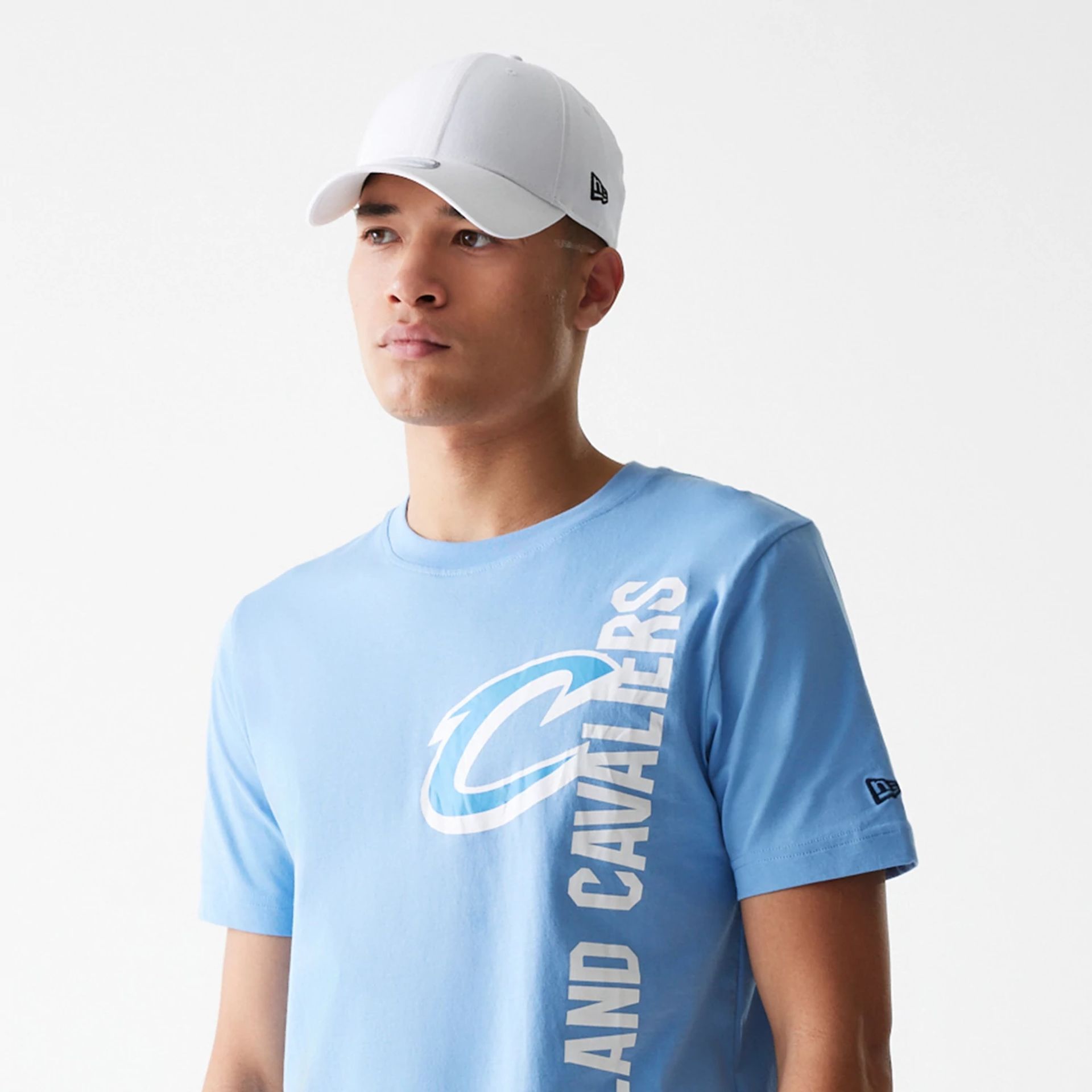 The Male model is wearing Cleveland Cavaliers NBA City Edition Pastel Blue T-Shirt 6