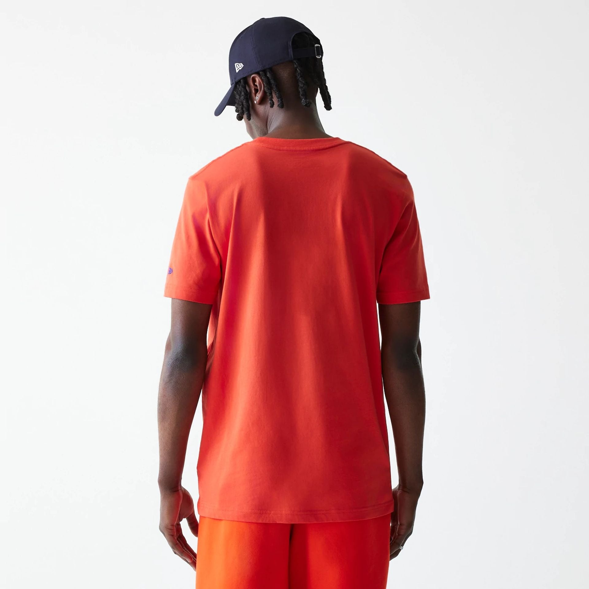 The Male model is wearing New York Knicks NBA City Edition Orange T-Shirt 2