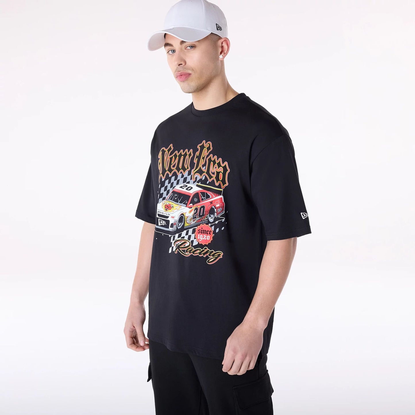 The Male model is wearing New Era 1920 Racing Black T-Shirt 5