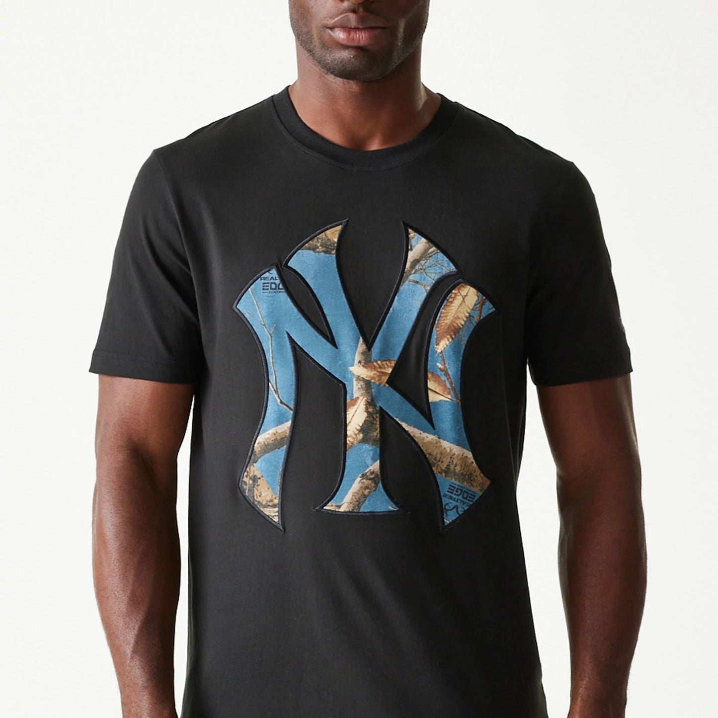 The Male model is wearing New York Yankees Realtree Edge Slate Black T-Shirt 3