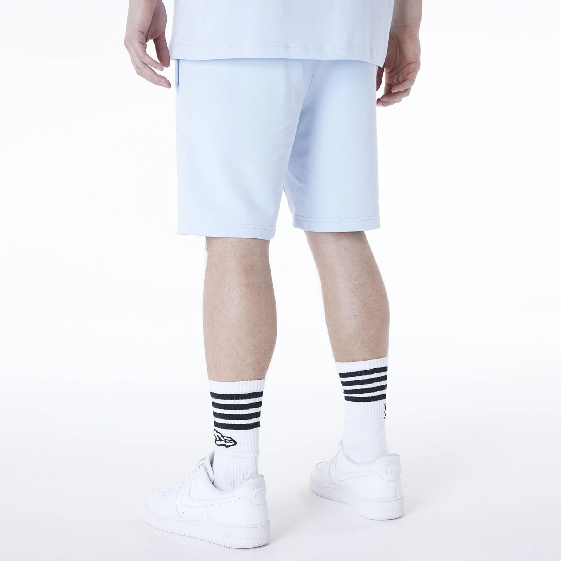 The Male model is wearing Detroit Tigers MLB League Essential Pastel Blue Shorts 2