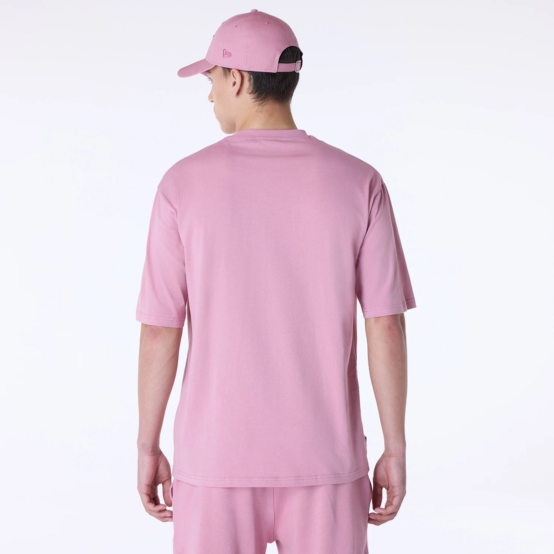 The Male model is wearing New York Yankees MLB League Essential Dark Pink Oversized T-Shirt 2