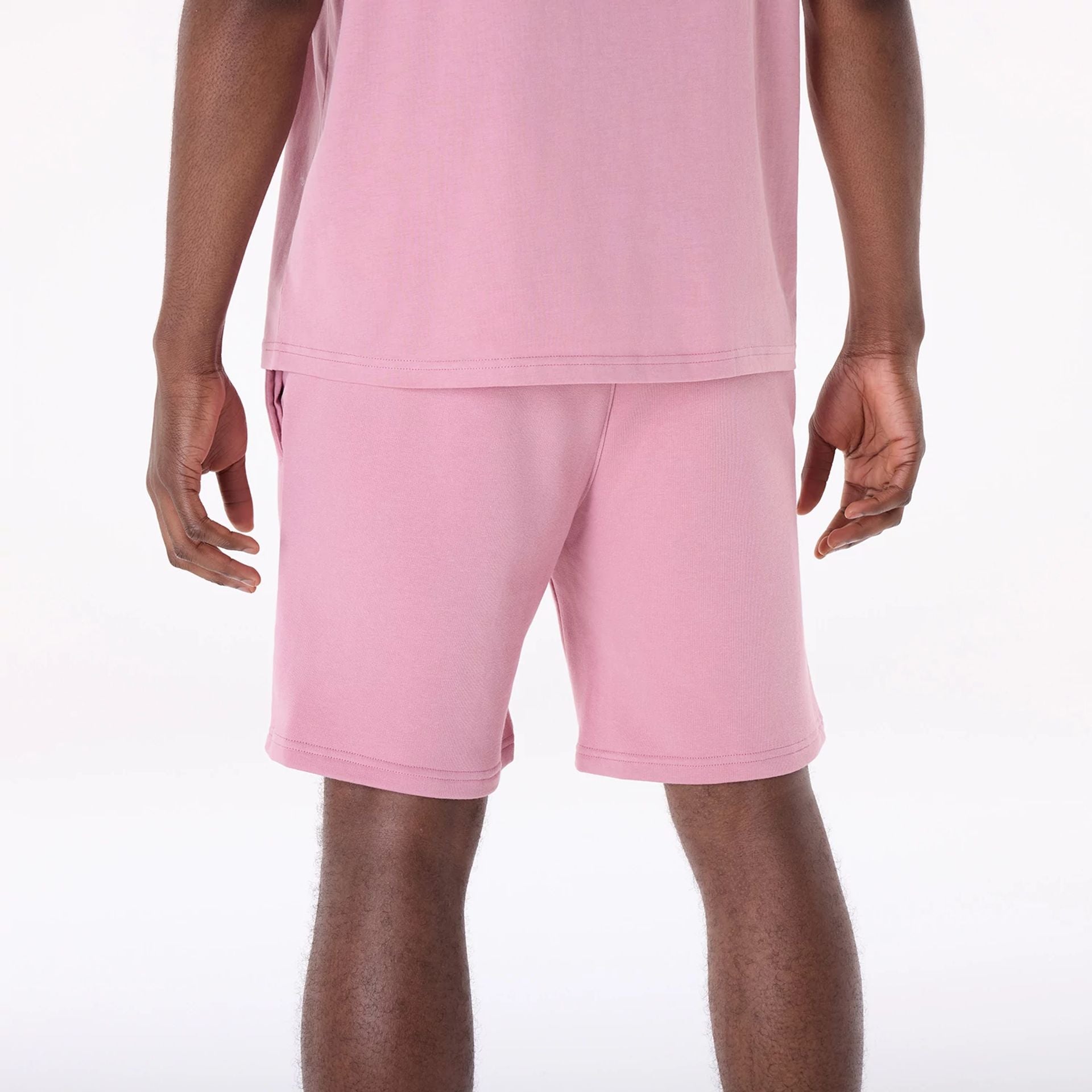 The Male model is wearing New York Yankees MLB League Essential Dark Pink Top And Shorts Set 2