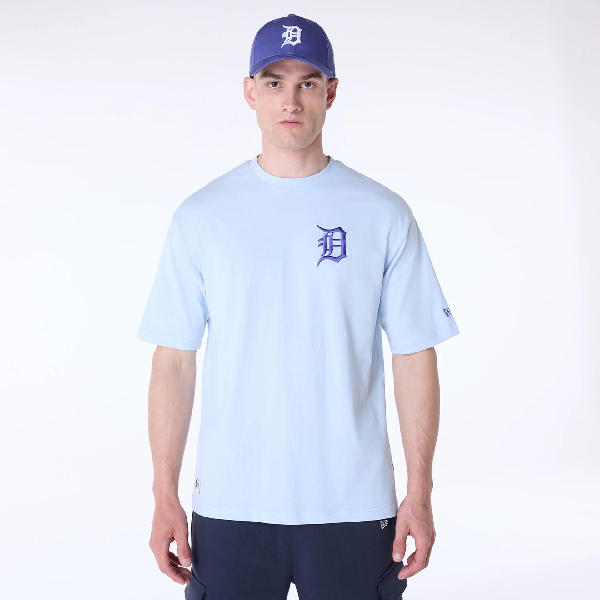 The Male model is wearing Detroit Tigers MLB League Essential Pastel Blue Oversized T-Shirt 1