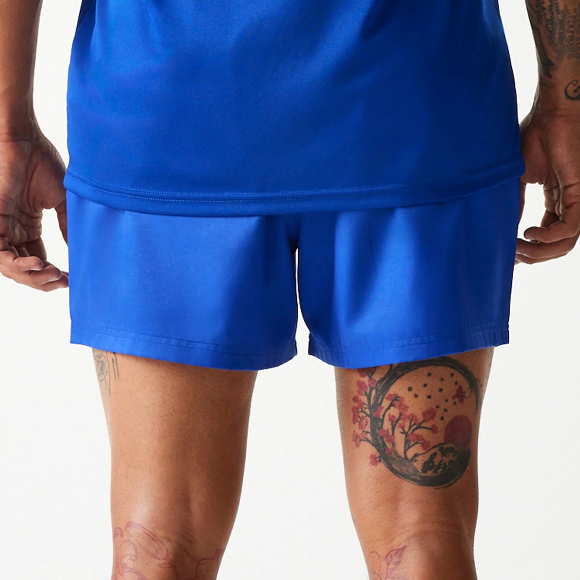 The Male model is wearing LA Dodgers MLB Essentials Blue Shorts 6