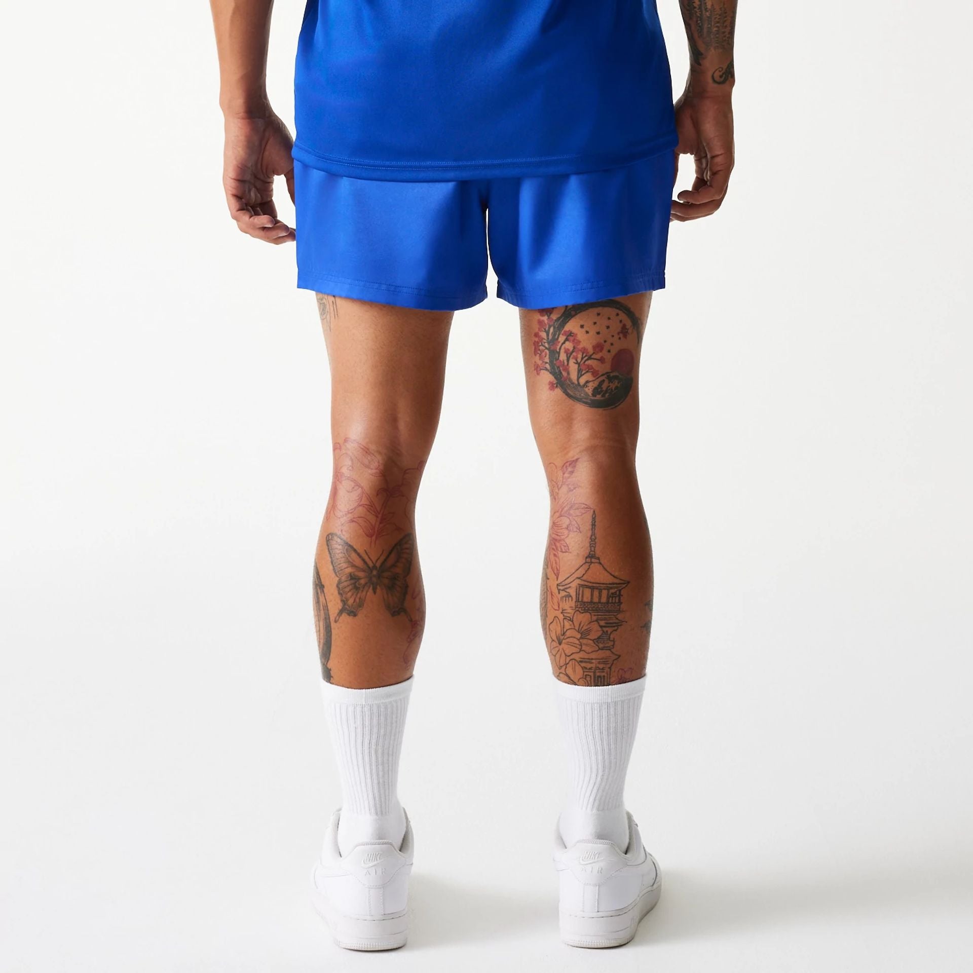 The Male model is wearing LA Dodgers MLB Essentials Blue Shorts 7