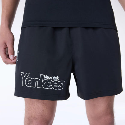 The Male model is wearing New York Yankees MLB Essentials Black Shorts 6