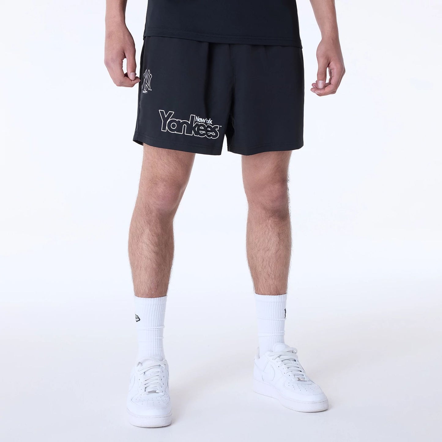 The Male model is wearing New York Yankees MLB Essential Black Top And Shorts Set 2