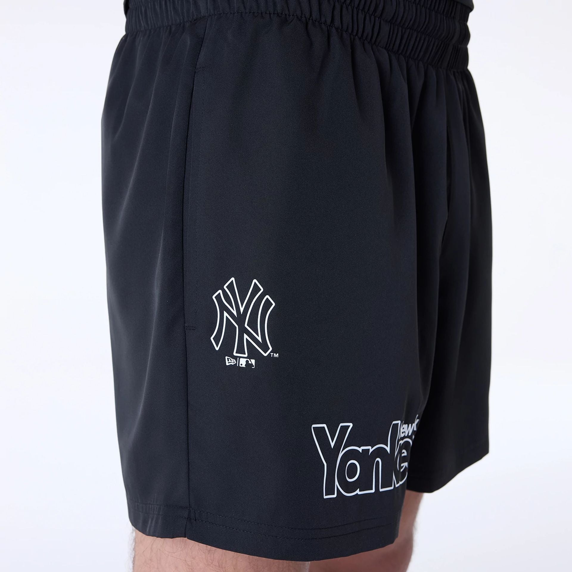 The Male model is wearing New York Yankees MLB Essentials Black Shorts 4