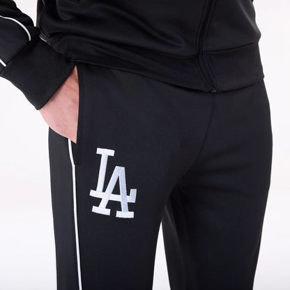 The Male model is wearing LA Dodgers MLB Track Pants Black Fleece Joggers 5