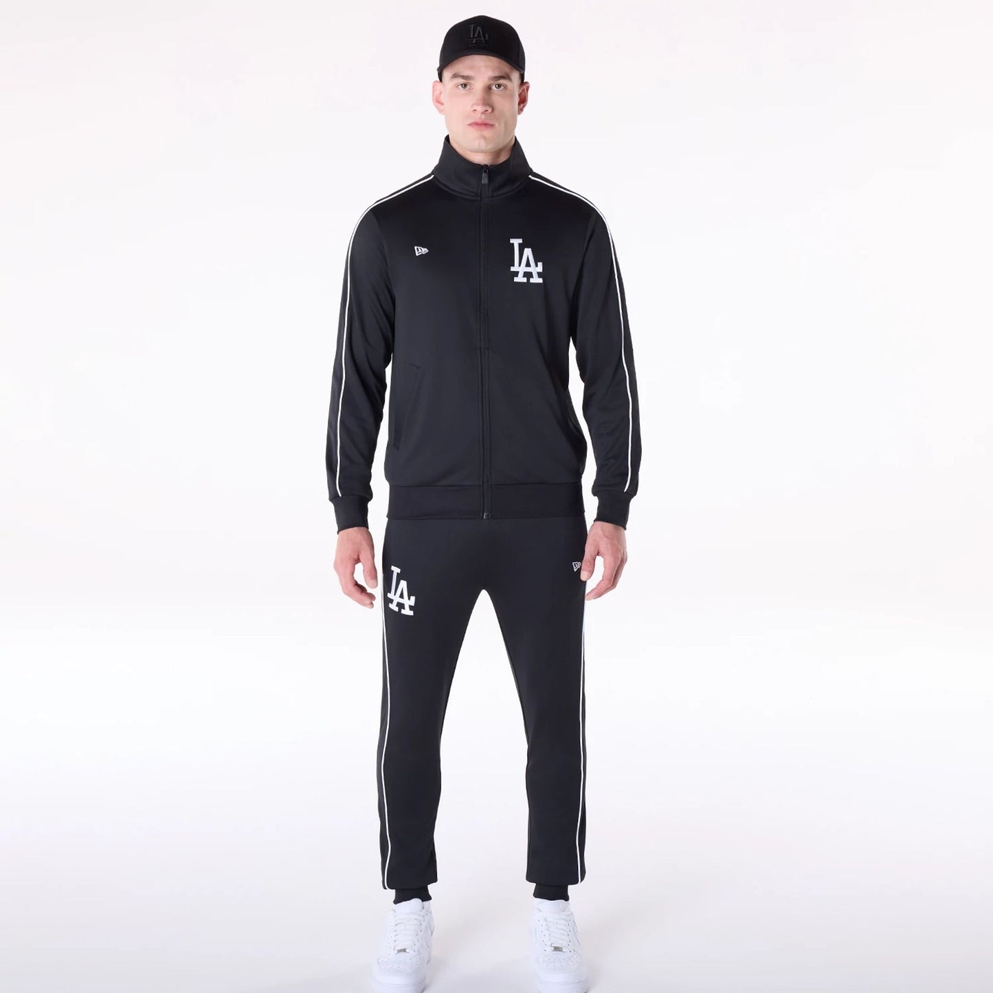 The Male model is wearing LA Dodgers MLB Track Pants Black Fleece Joggers 8