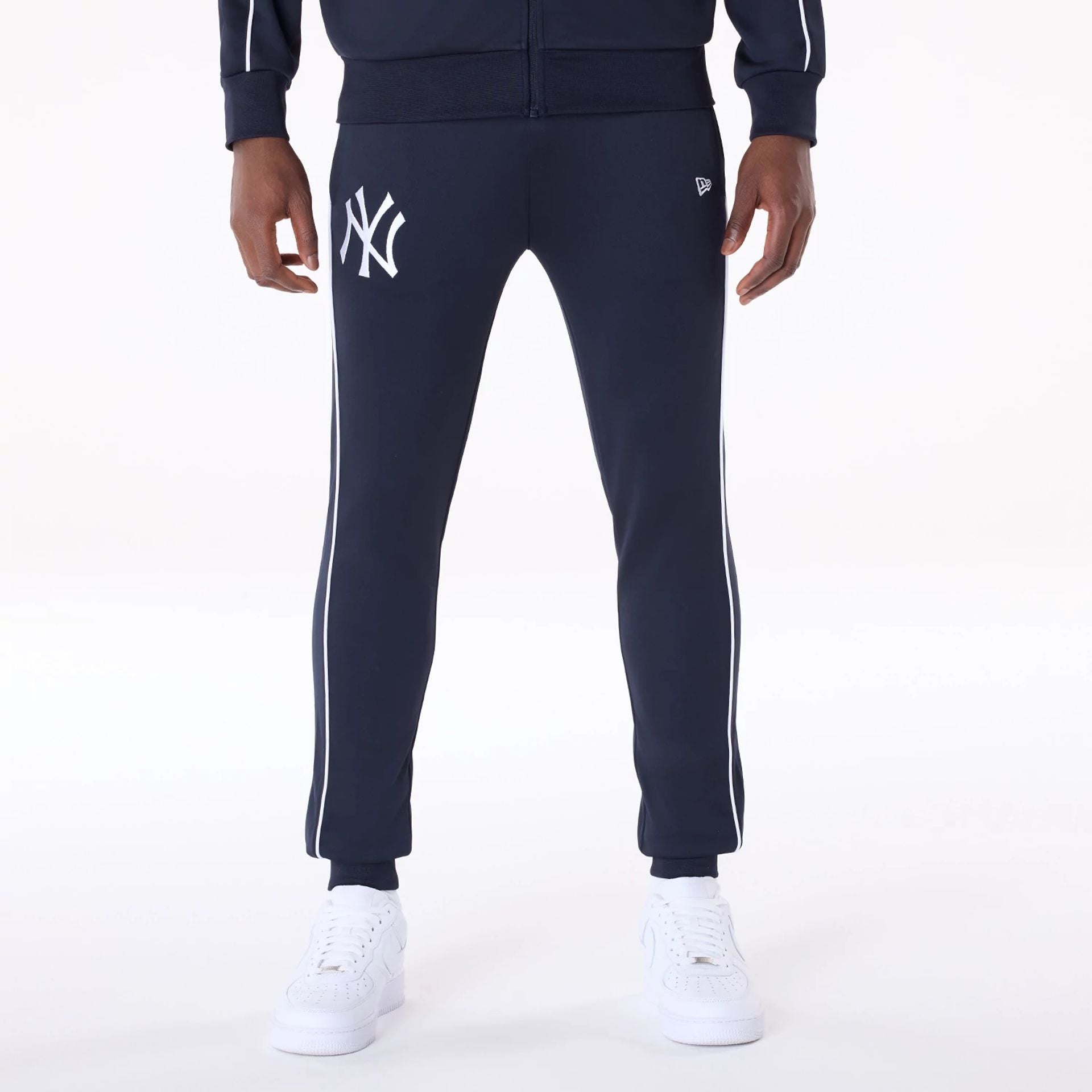 The Male model is wearing New York Yankees MLB Poly Track Set Navy Track Suit 4