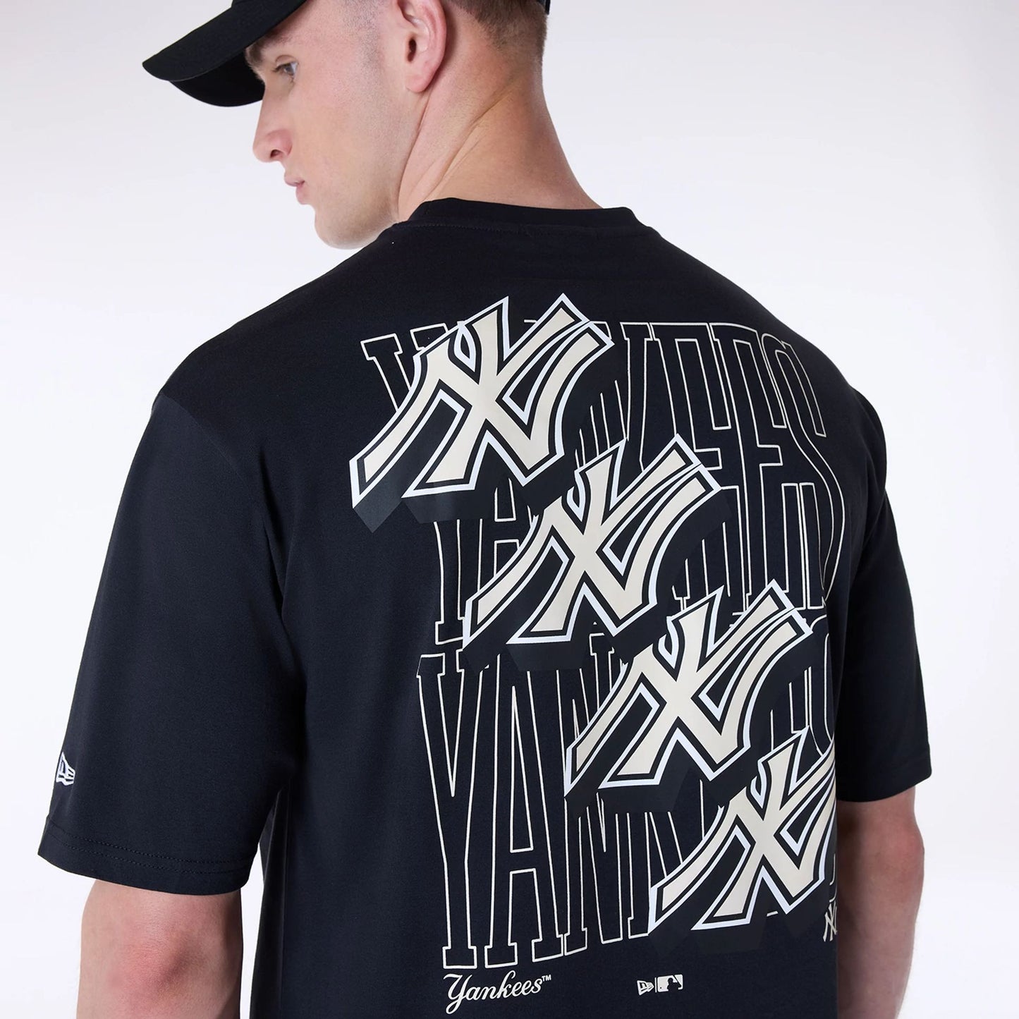 The Male model is wearing New York Yankees MLB Wordmark Black Oversized T-Shirt 4