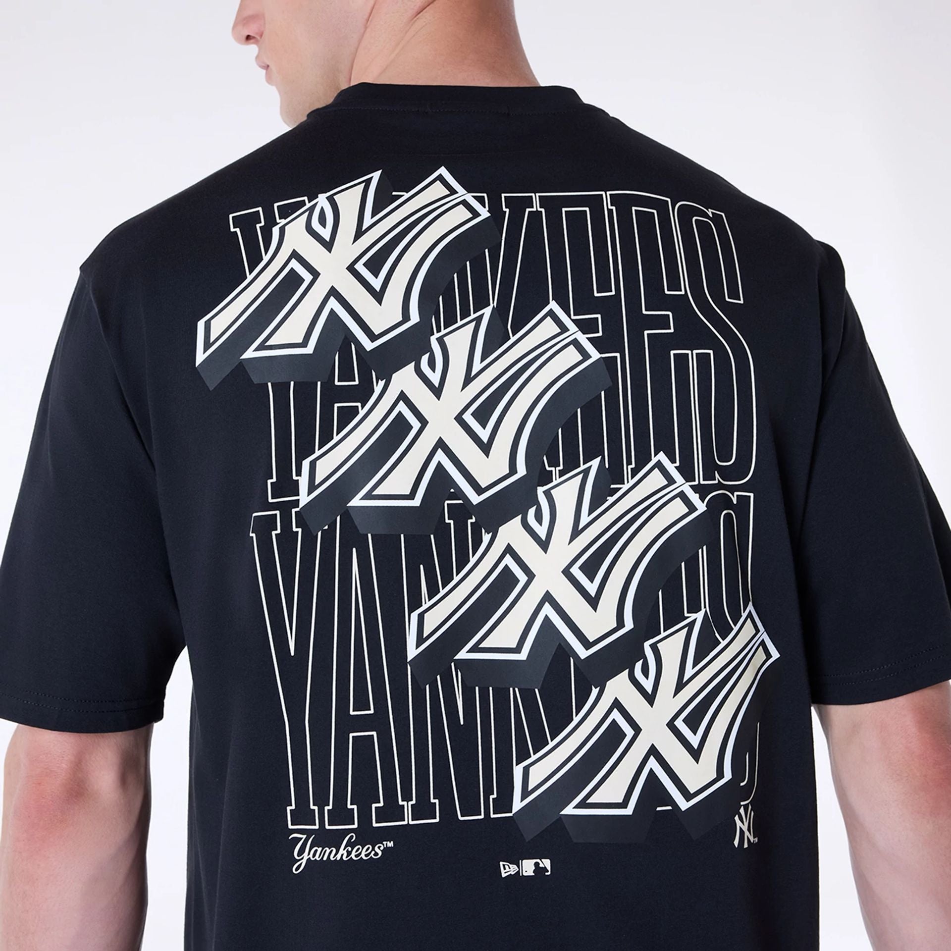 The Male model is wearing New York Yankees MLB Wordmark Black Oversized T-Shirt 2