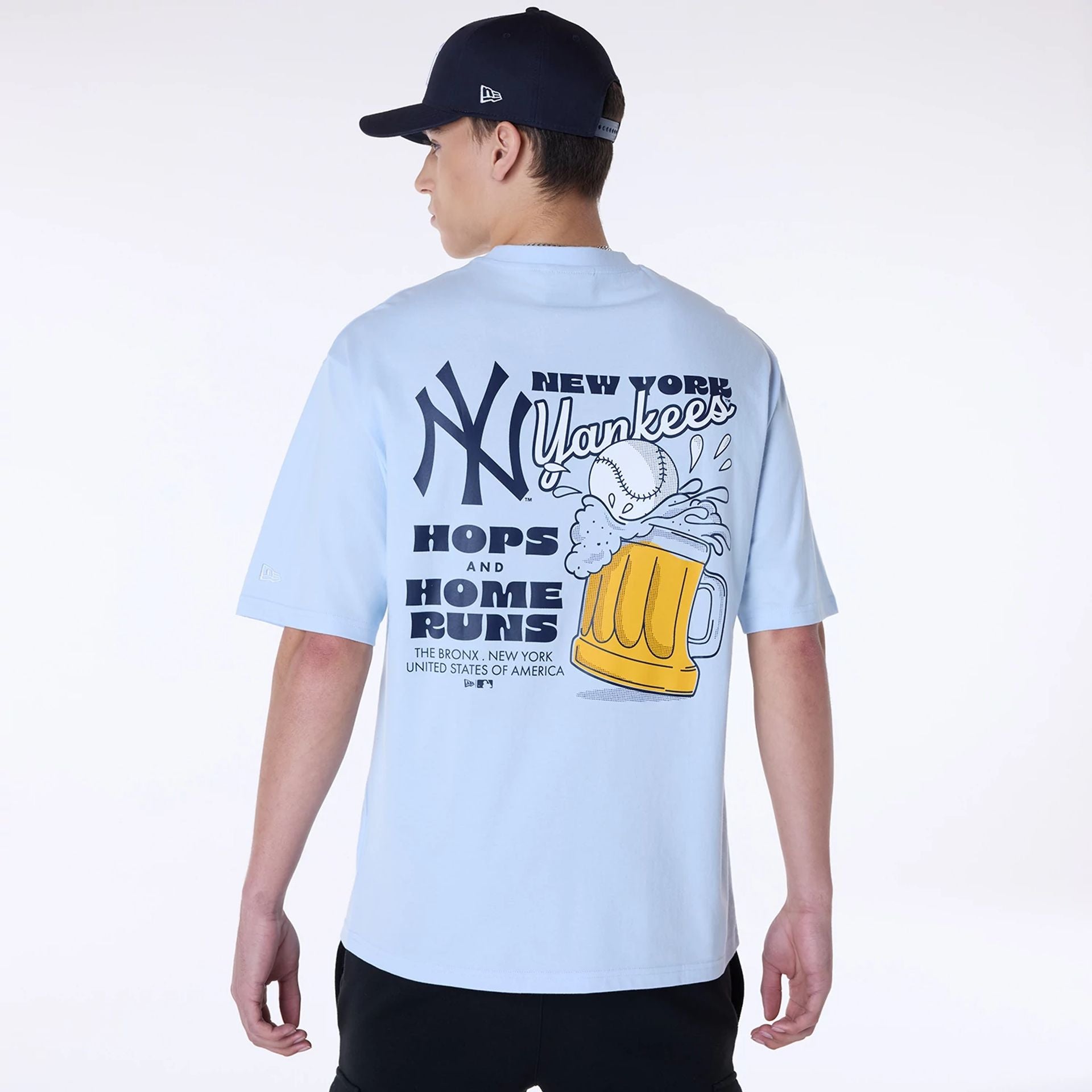 The Male model is wearing New York Yankees MLB Food Graphic Pastel Blue Oversized T-Shirt 2