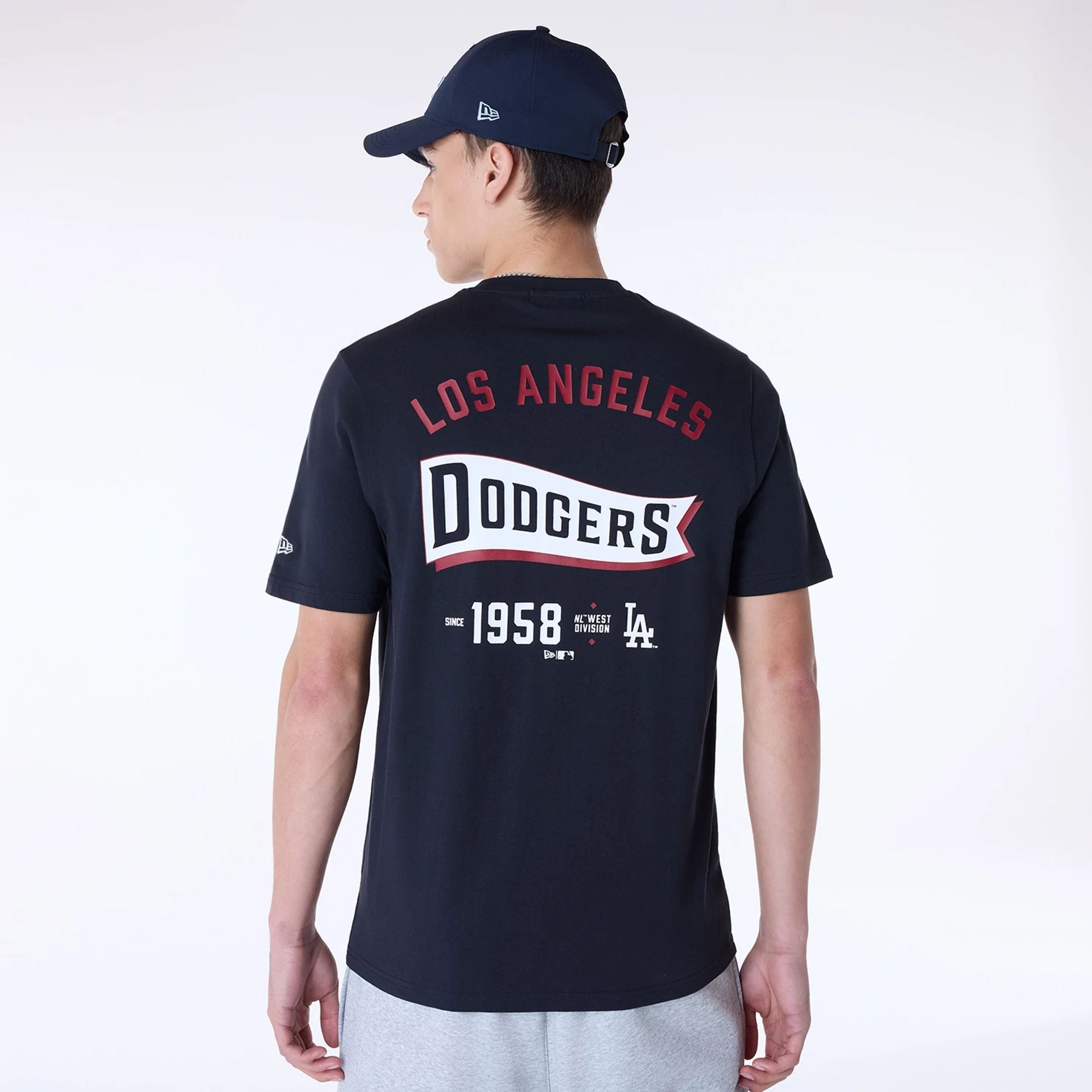 The Male model is wearing LA Dodgers MLB Pennant Graphic Navy T-Shirt 2