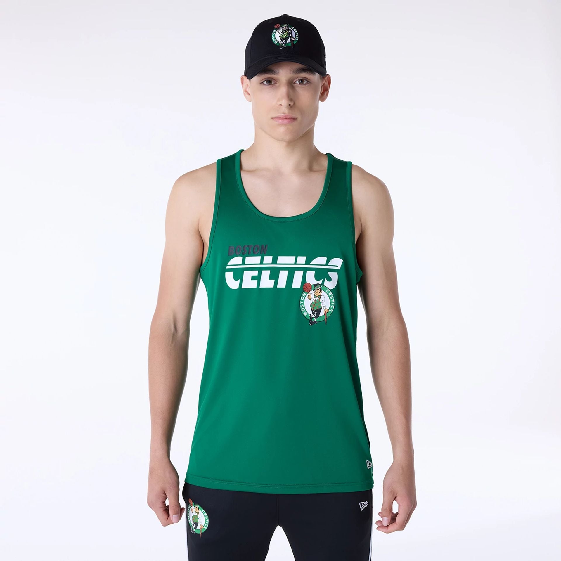 The Male model is wearing Boston Celtics NBA Essentials Green Vest 1