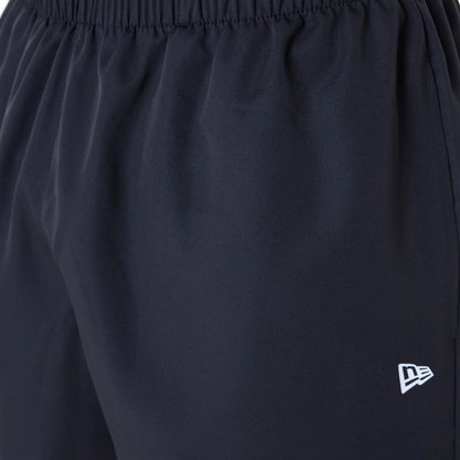 The Male model is wearing New Era Essential Black Shorts 4