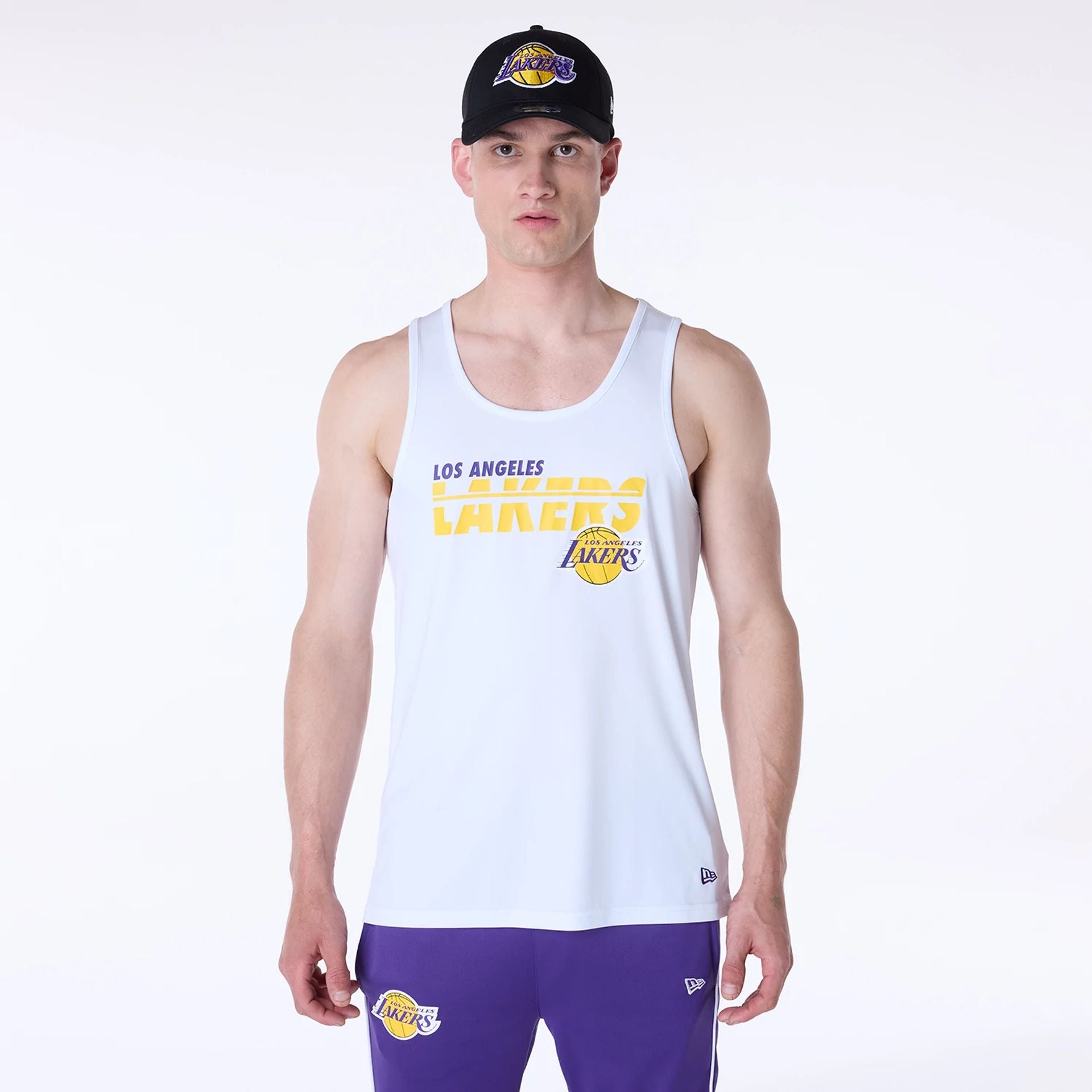 The Male model is wearing LA Lakers NBA Essentials White Vest 1