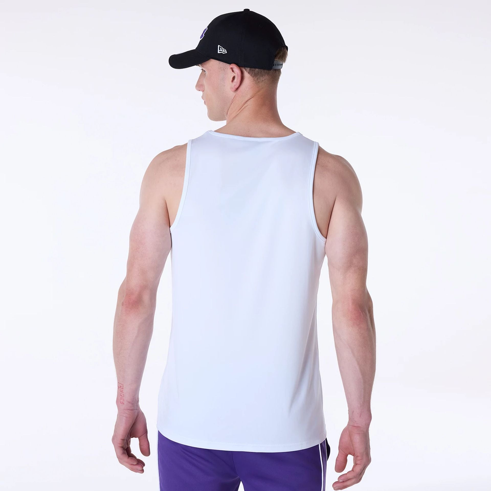 The Male model is wearing LA Lakers NBA Essentials White Vest 2