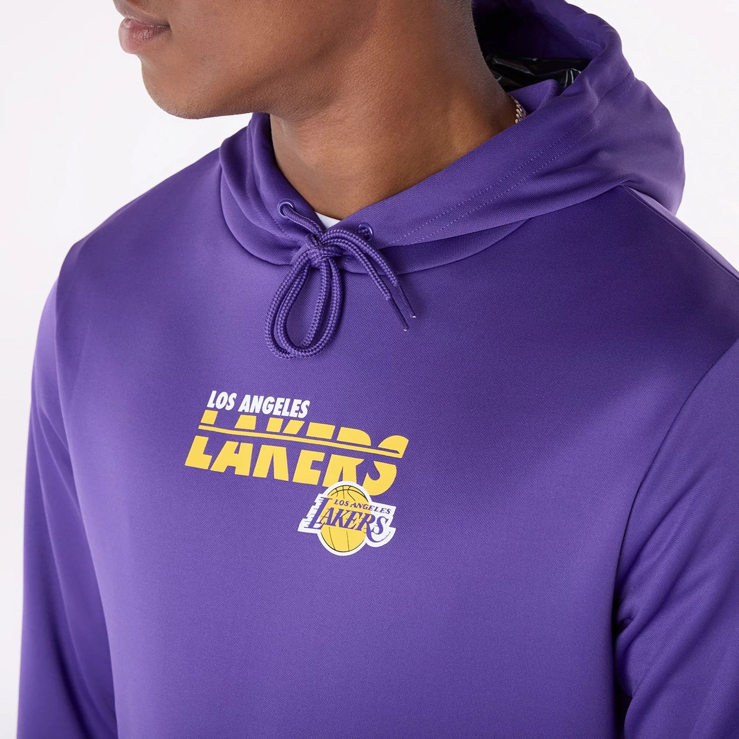 The Male model is wearing LA Lakers NBA Essentials Purple Pullover Hoodie 4