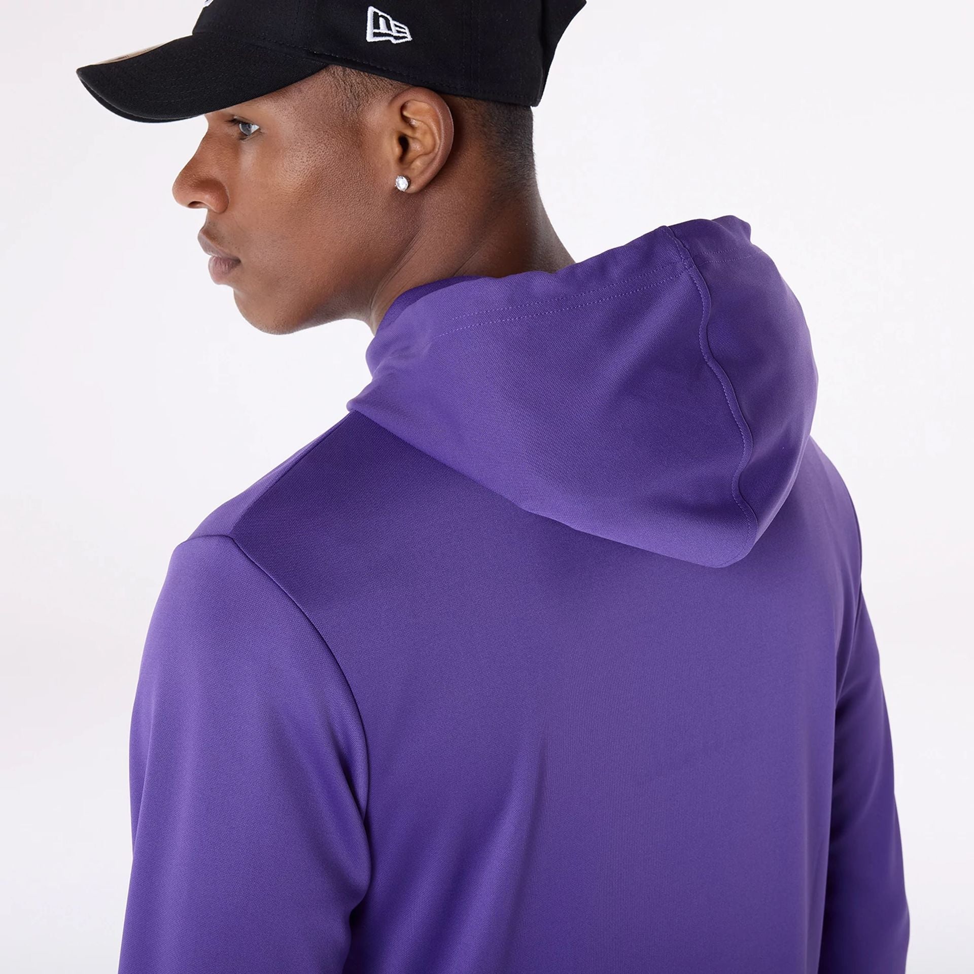 The Male model is wearing LA Lakers NBA Essentials Purple Pullover Hoodie 5