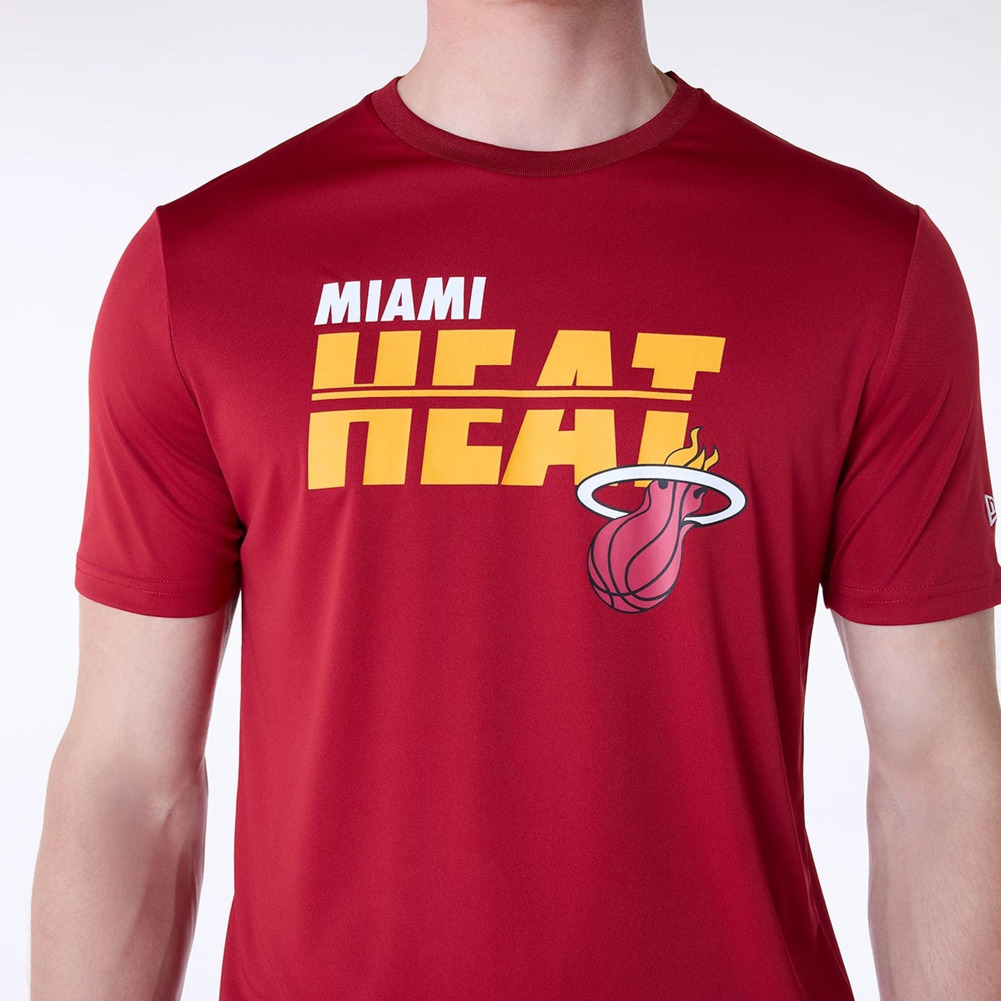 The Male model is wearing Miami Heat NBA Essentials Dark Red T-Shirt 4