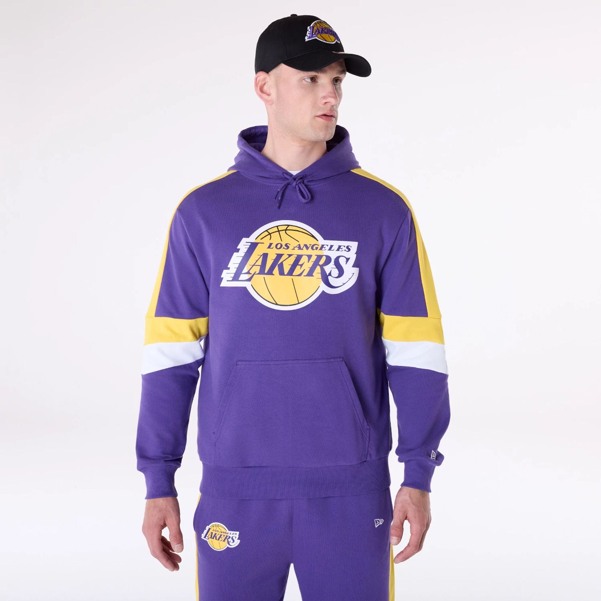 The Male model is wearing LA Lakers Colour Block Purple Oversized Pullover Hoodie 1