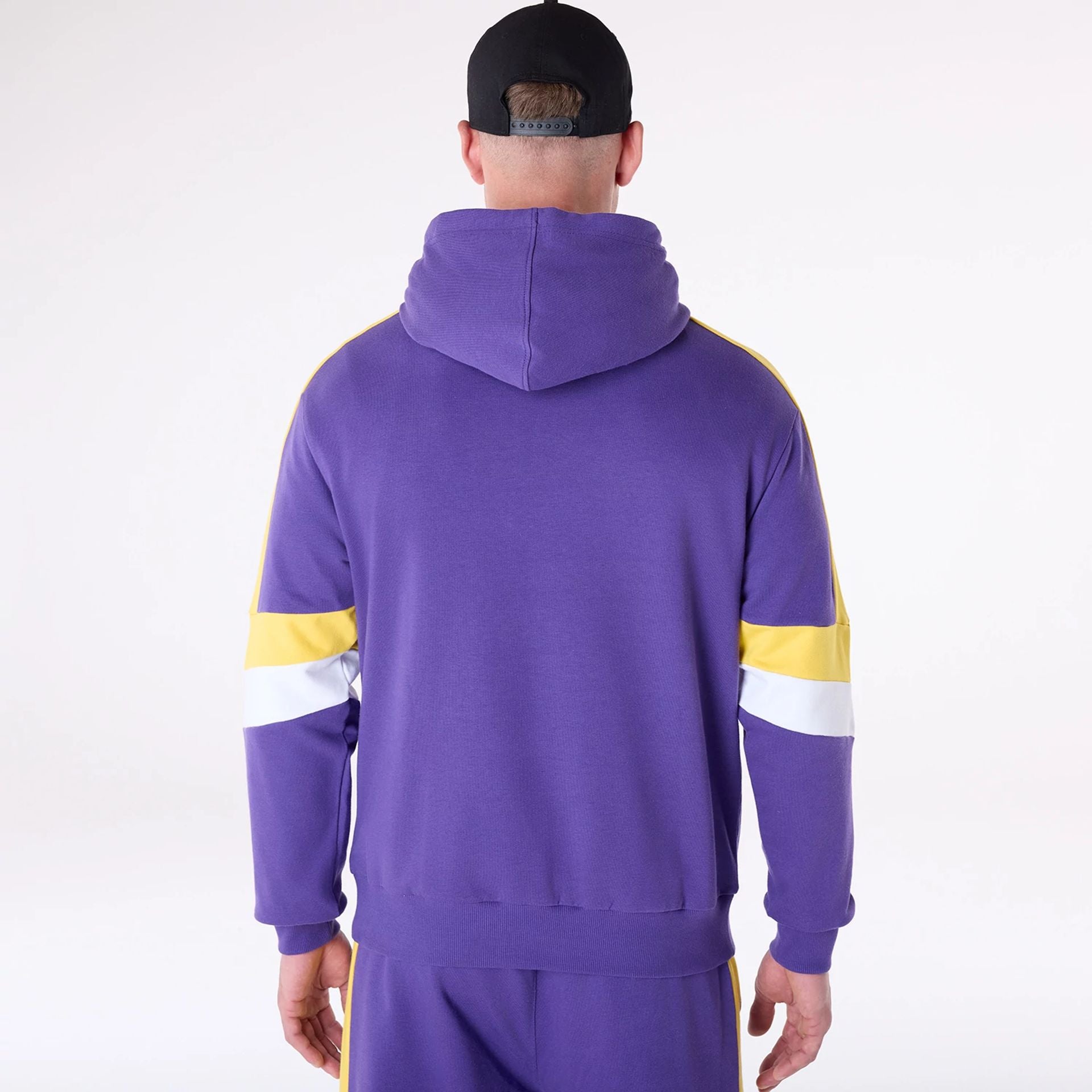 The Male model is wearing LA Lakers Colour Block Purple Oversized Pullover Hoodie 2